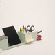 Illustration for article titled This Desk Tidy Folds Into Shape From a Sheet of Laser-Cut Steel